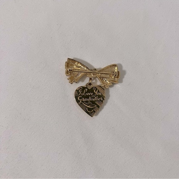 Vintage Avon Engraved Gold Tone Textured Ribbon Hanging Heart Brooch Pin EUC - Picture 4 of 4